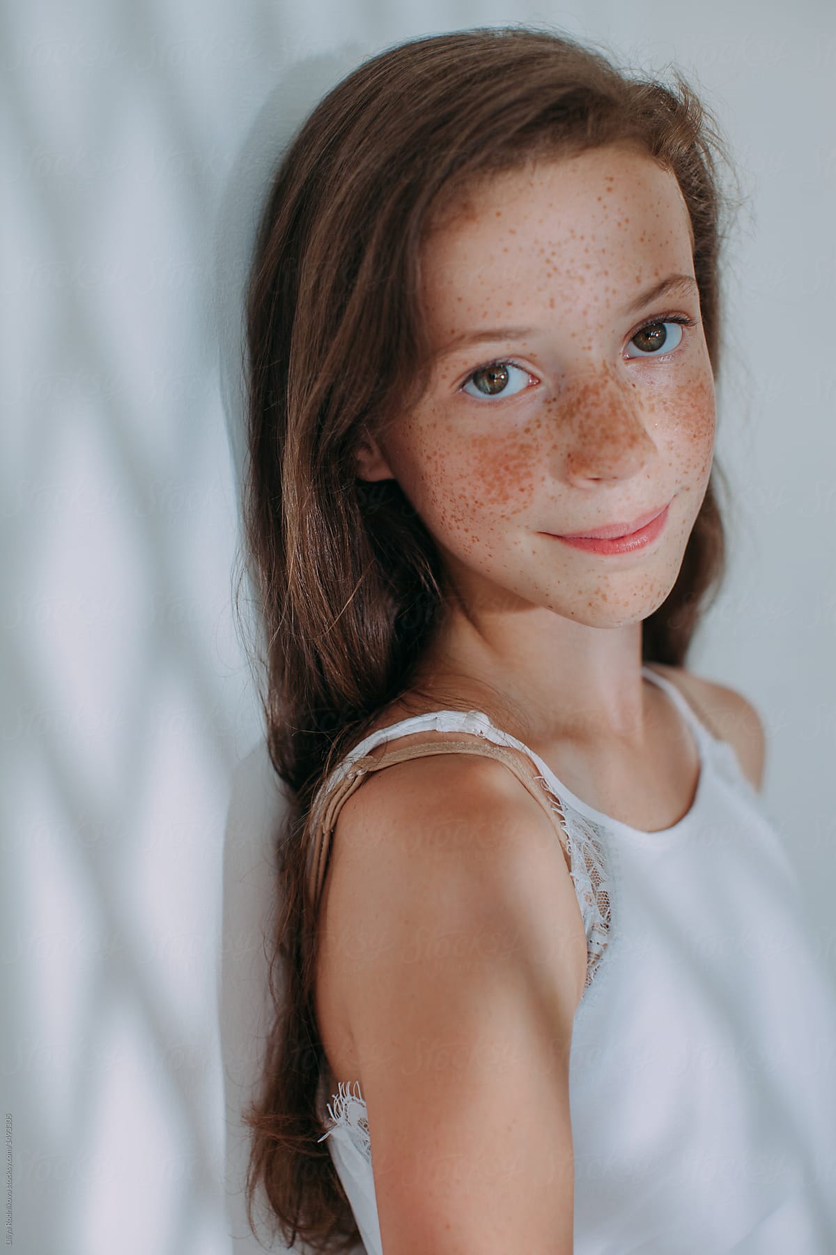 Face Of A Beautiful Girl With Freckles Close-Up Download 