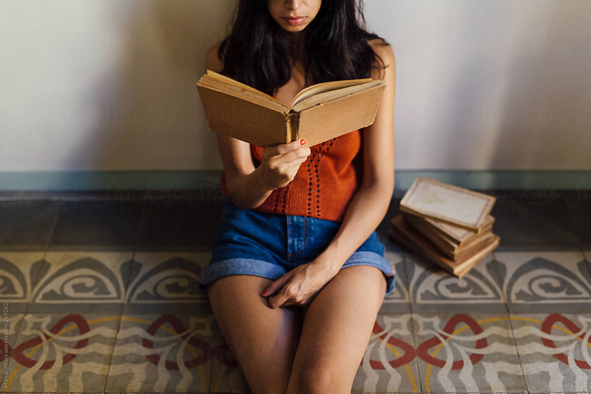Girl reading a book.