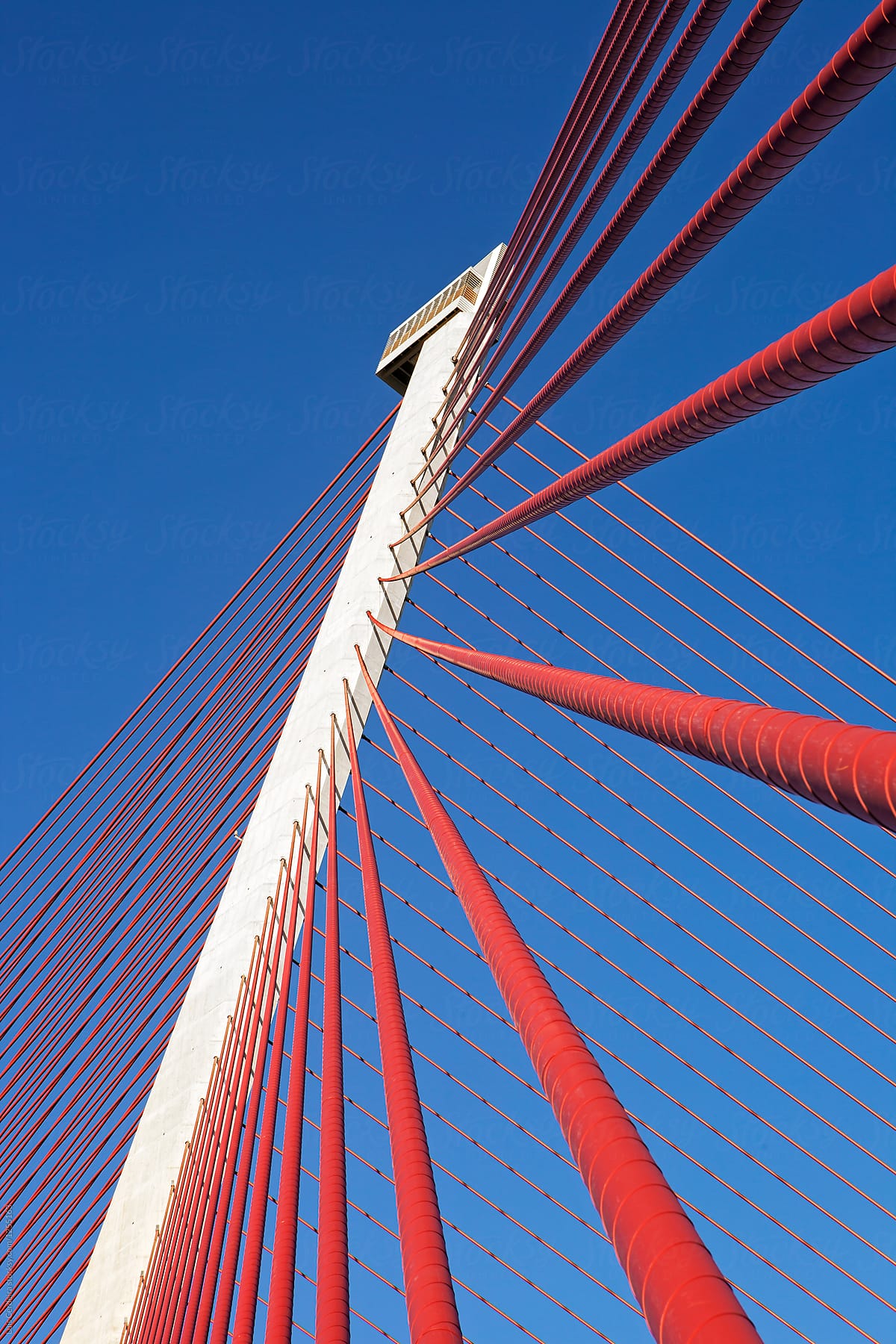 Cable-stayed bridge against clear blue sky