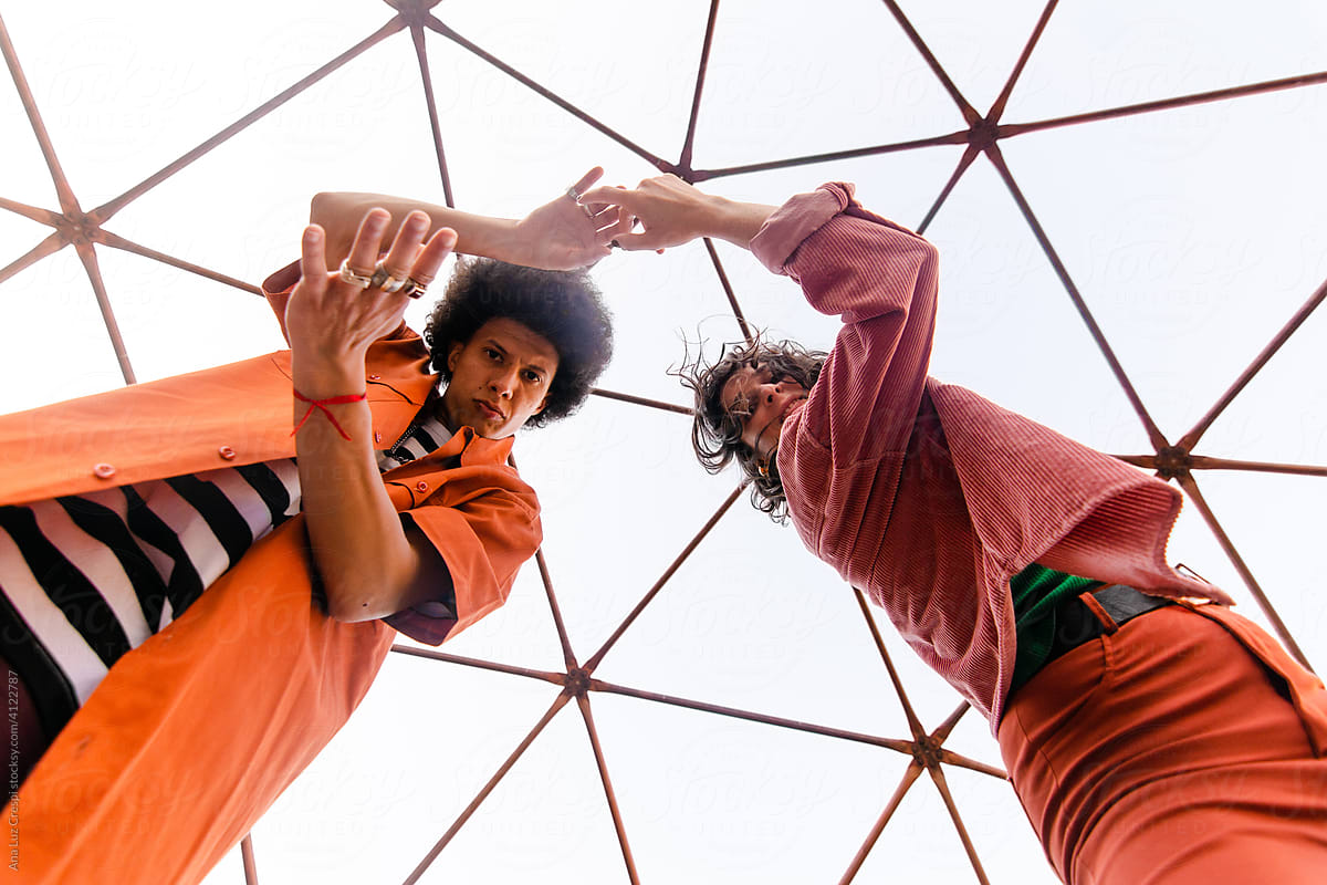 Cool millennial couple dancing insde a dome
