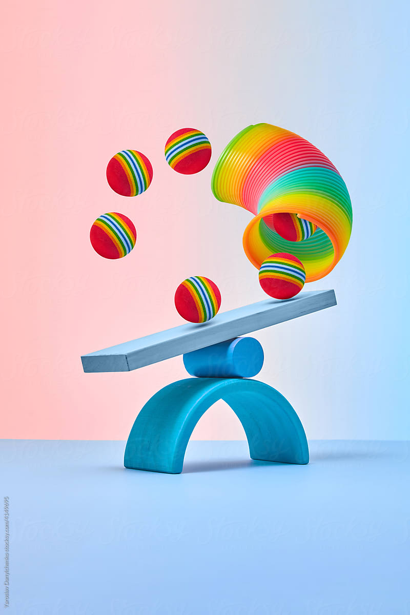 Helical spring toy and balls balancing