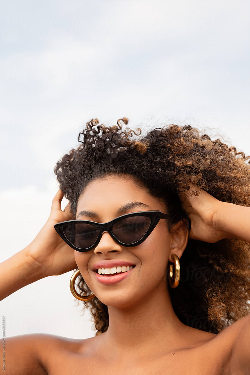 Joyful Woman with Trendy Sunglasses\