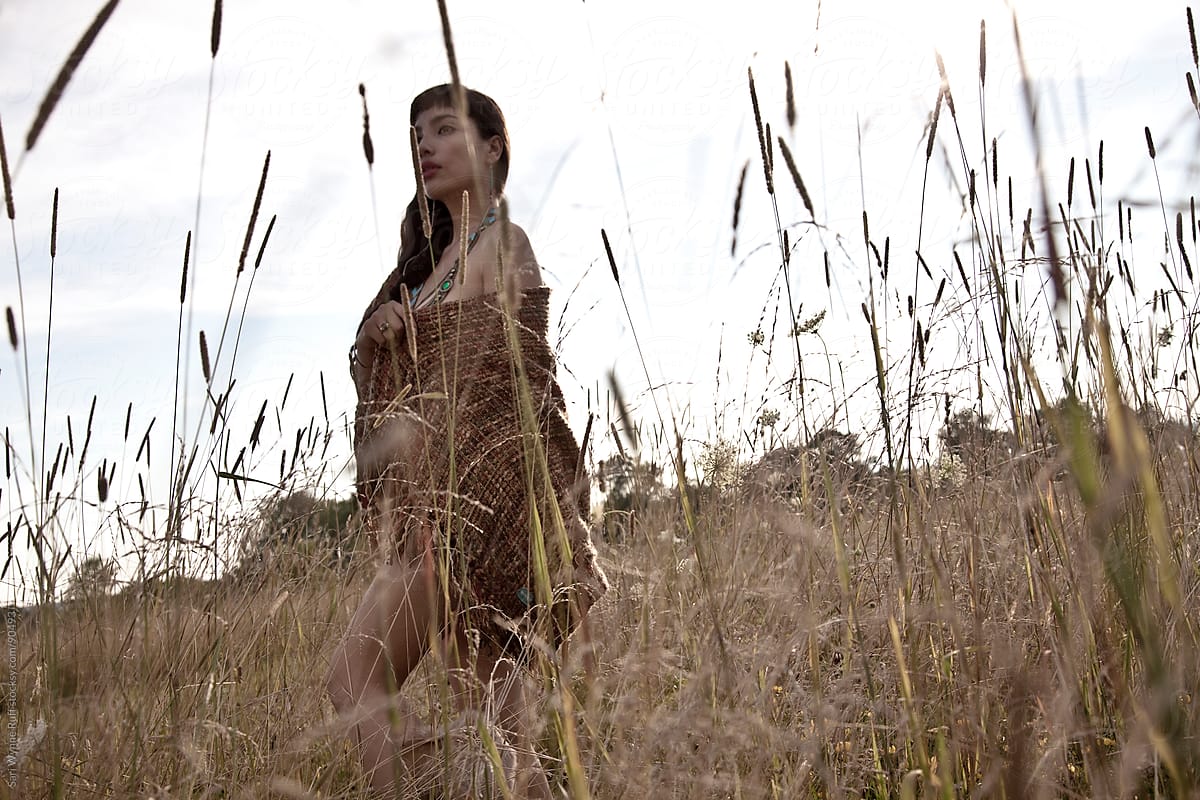 Nude Woman In Blanket In Field By Stocksy Contributor Sari Wynne