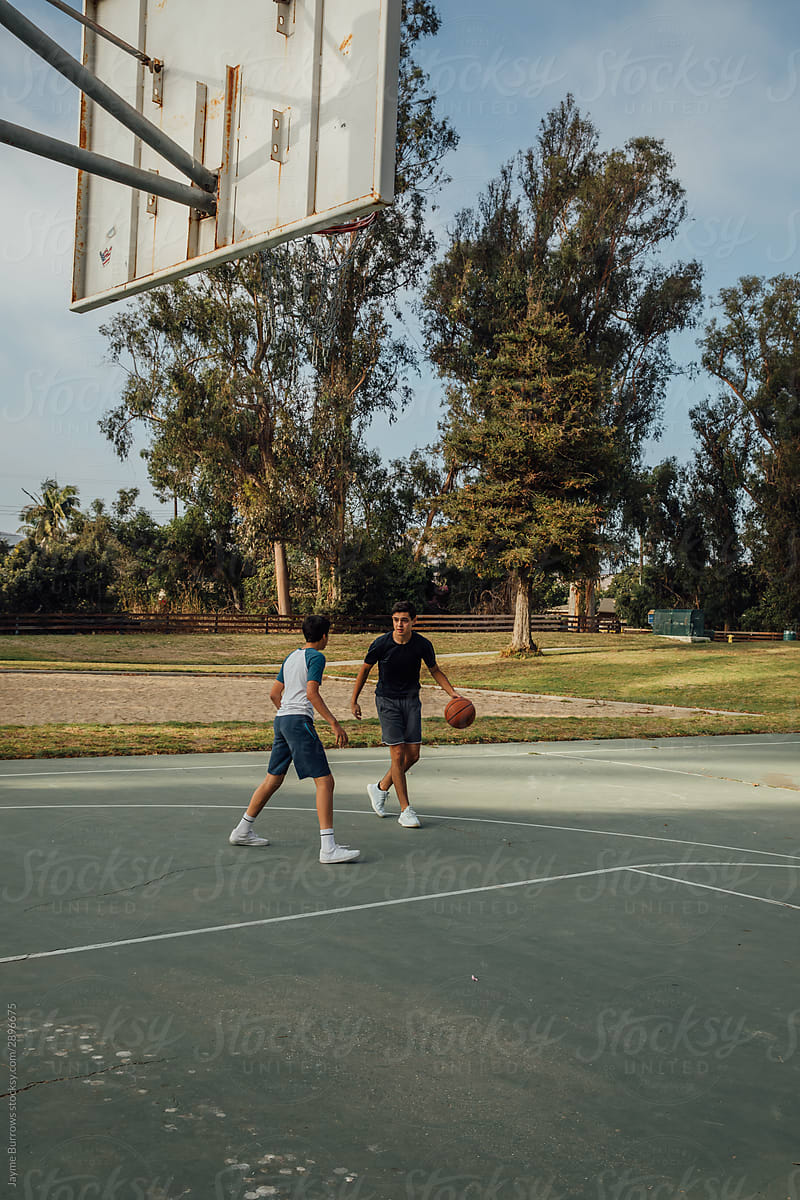 Brothers Playing Basketball
