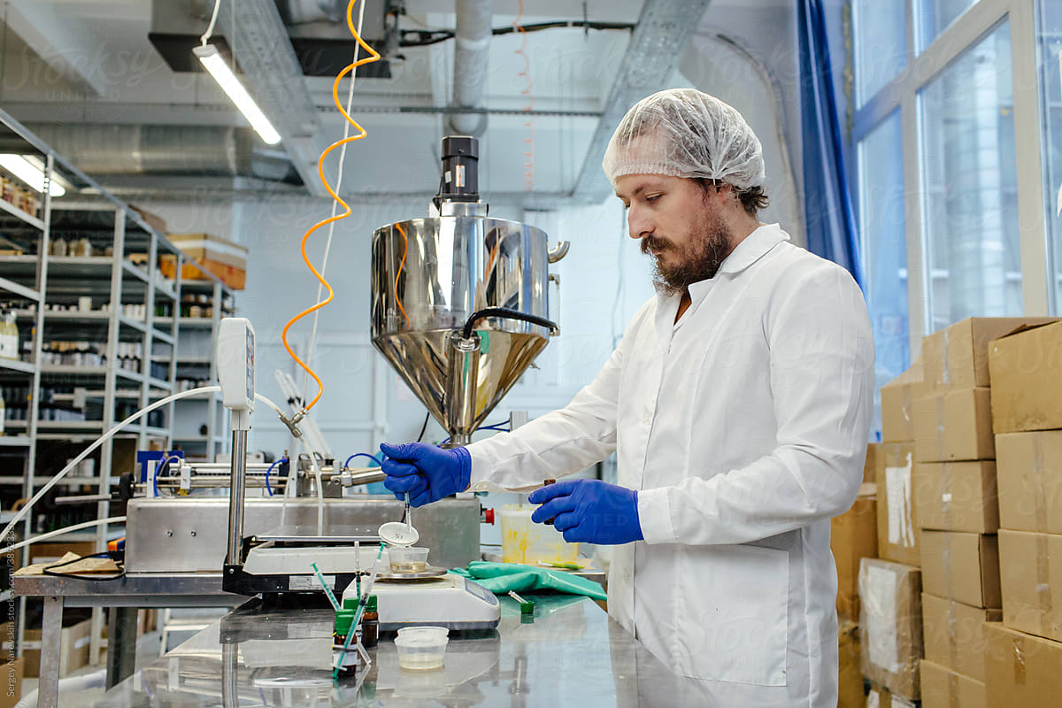 Scientist working in laboratory at cosmetics factory
