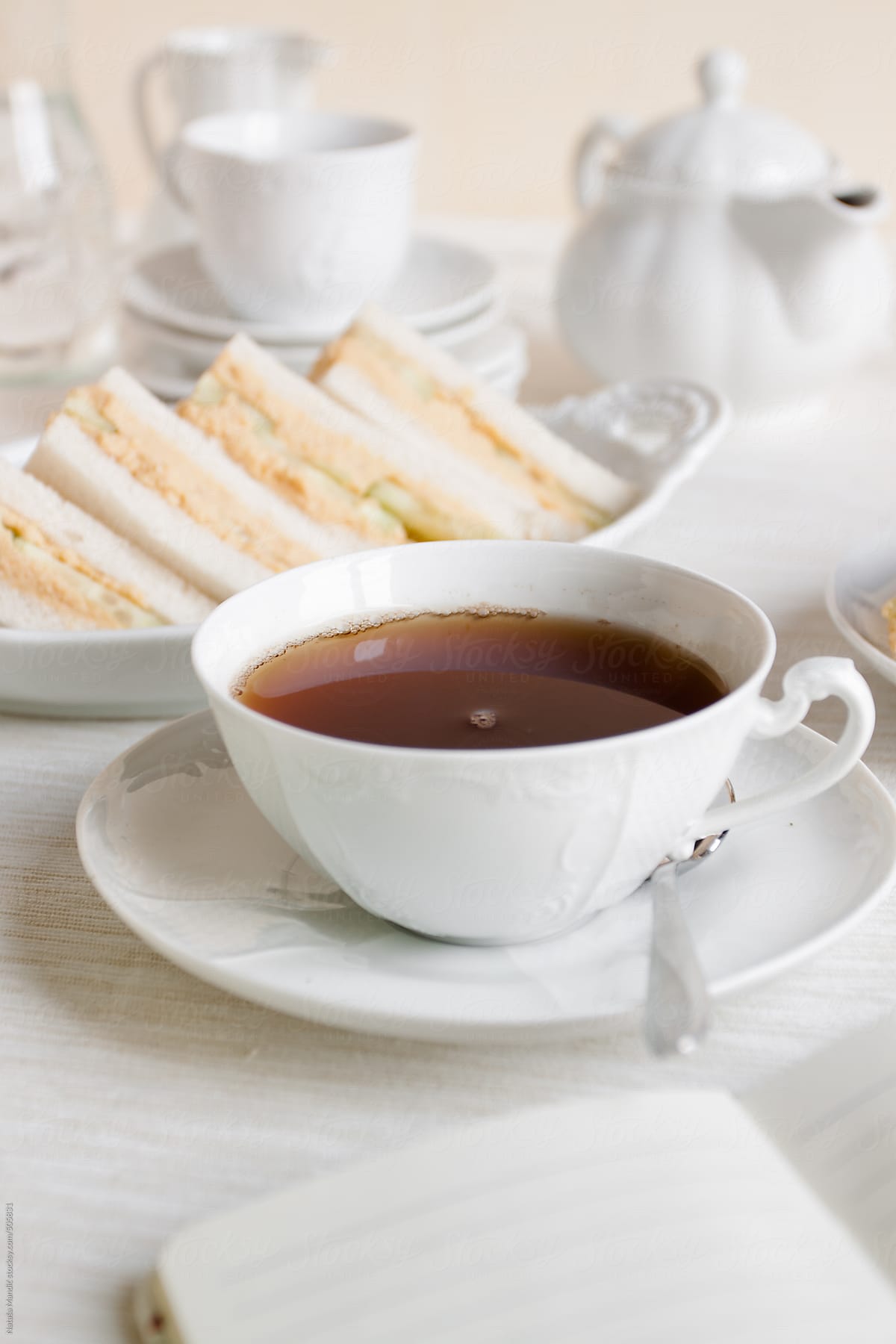 Cup of tea with tea sandwiches