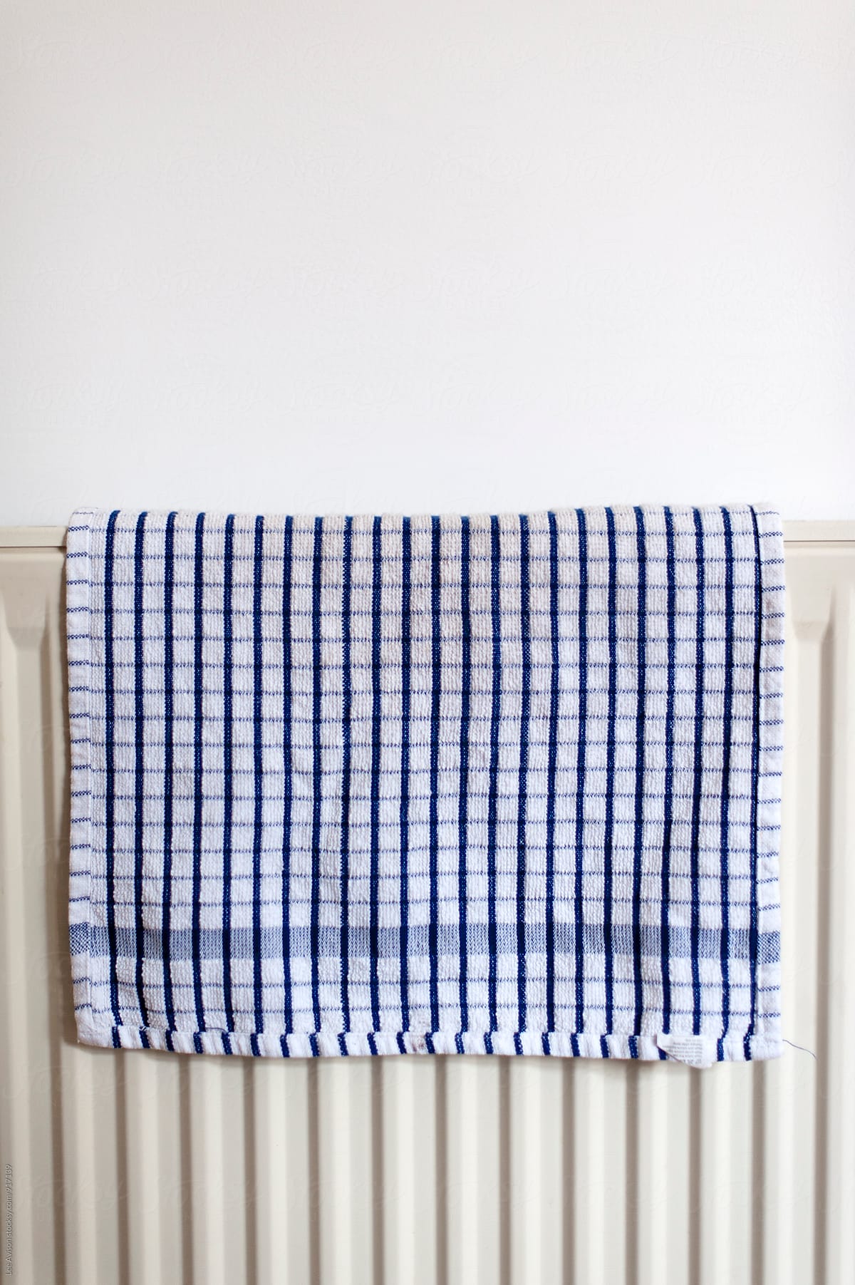 checkered tea towel on a radiator