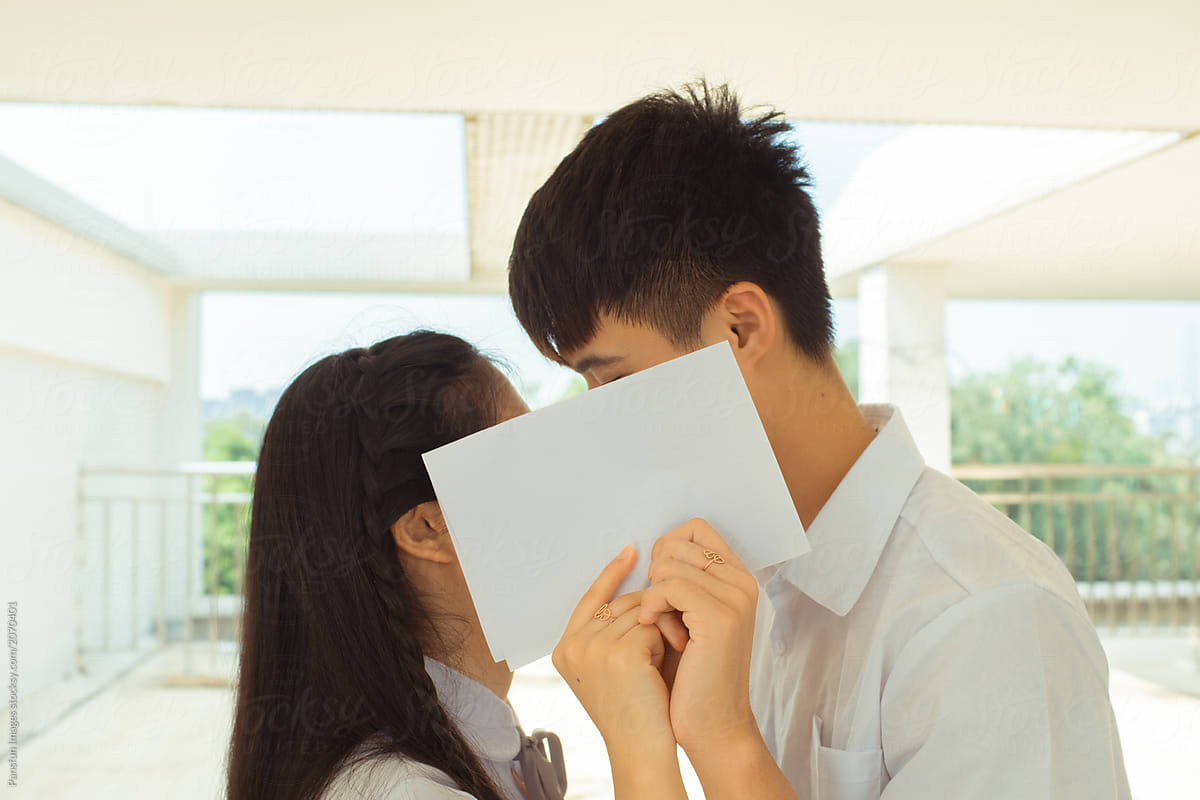 Young Asian College Couple Kissing By Pansfun Images 