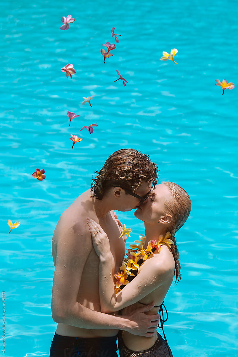 Couple In Love Kissing At Swimming Pool