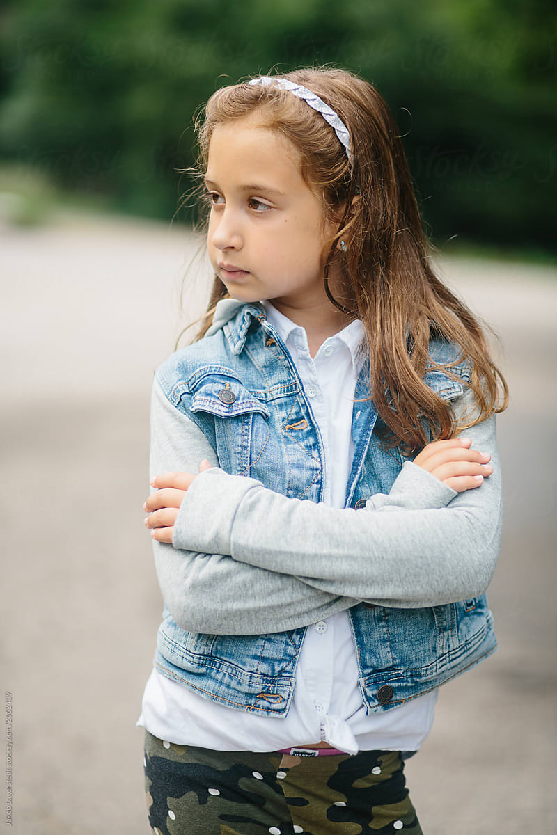 Portrait Of A Cute Young Girl In A Hooded Denim Jacket Del 2489