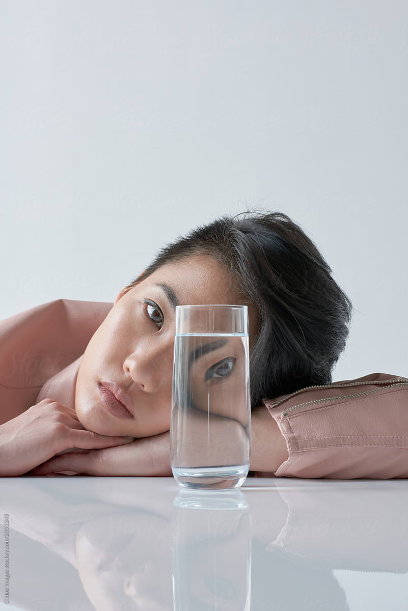 Upset Woman With Water Glass