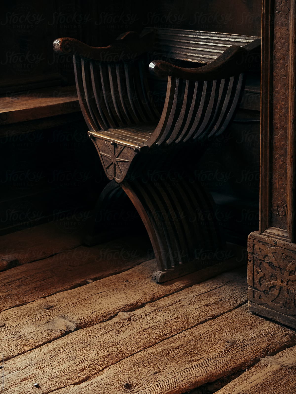 antique chair in a wooden room