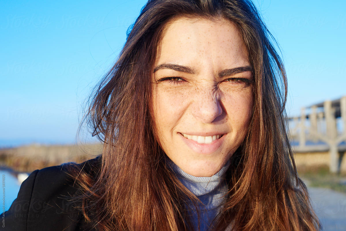 Happy Girl With Freckles Making Face At Camera By Stocksy Contributor Guille Faingold Stocksy 
