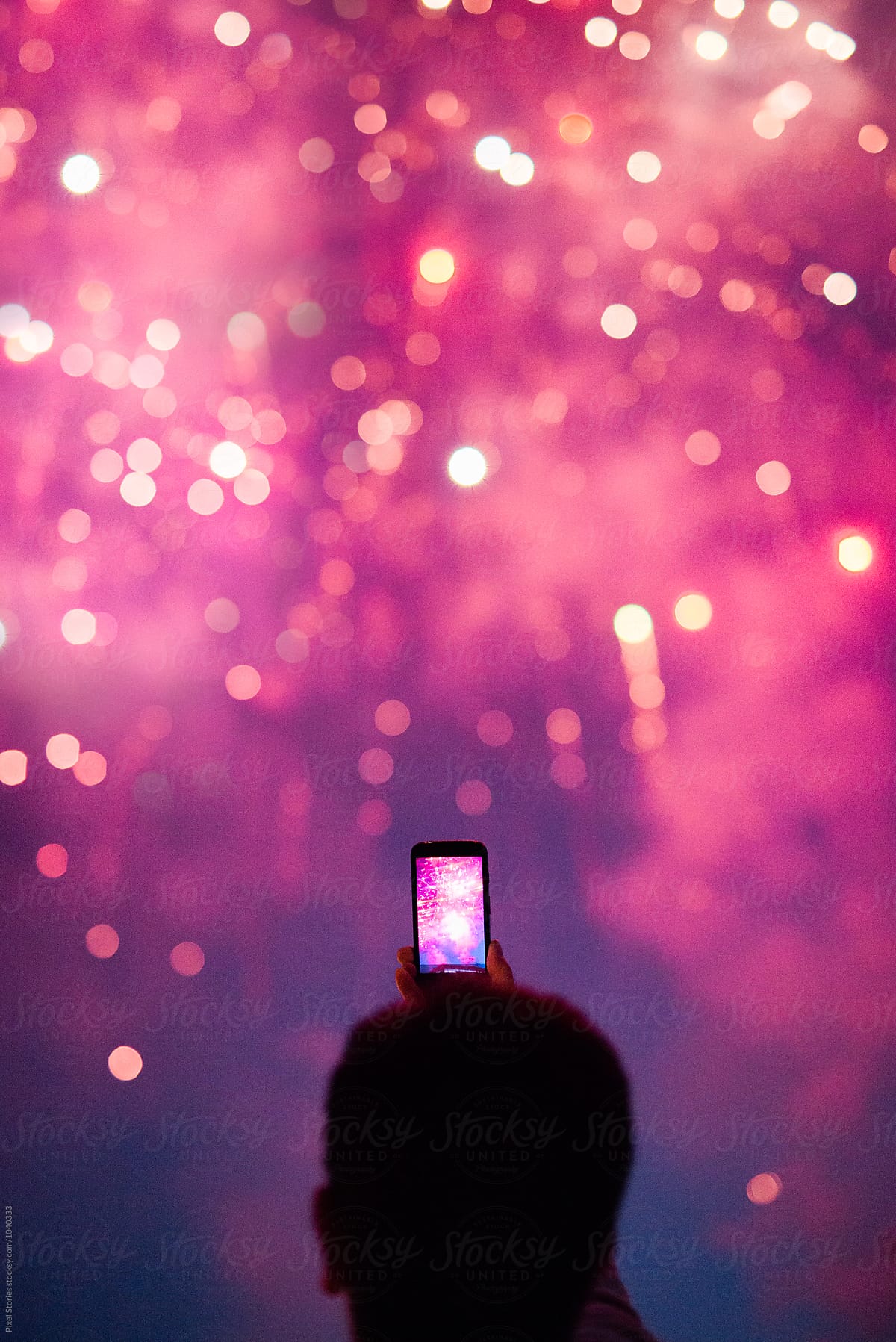 Person watching fireworks