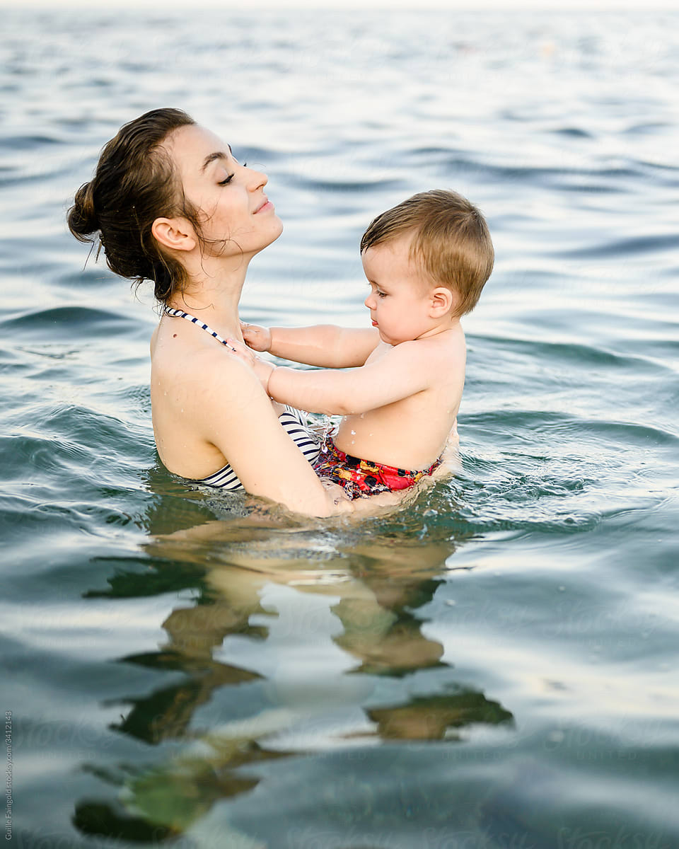Mom and baby in sea.