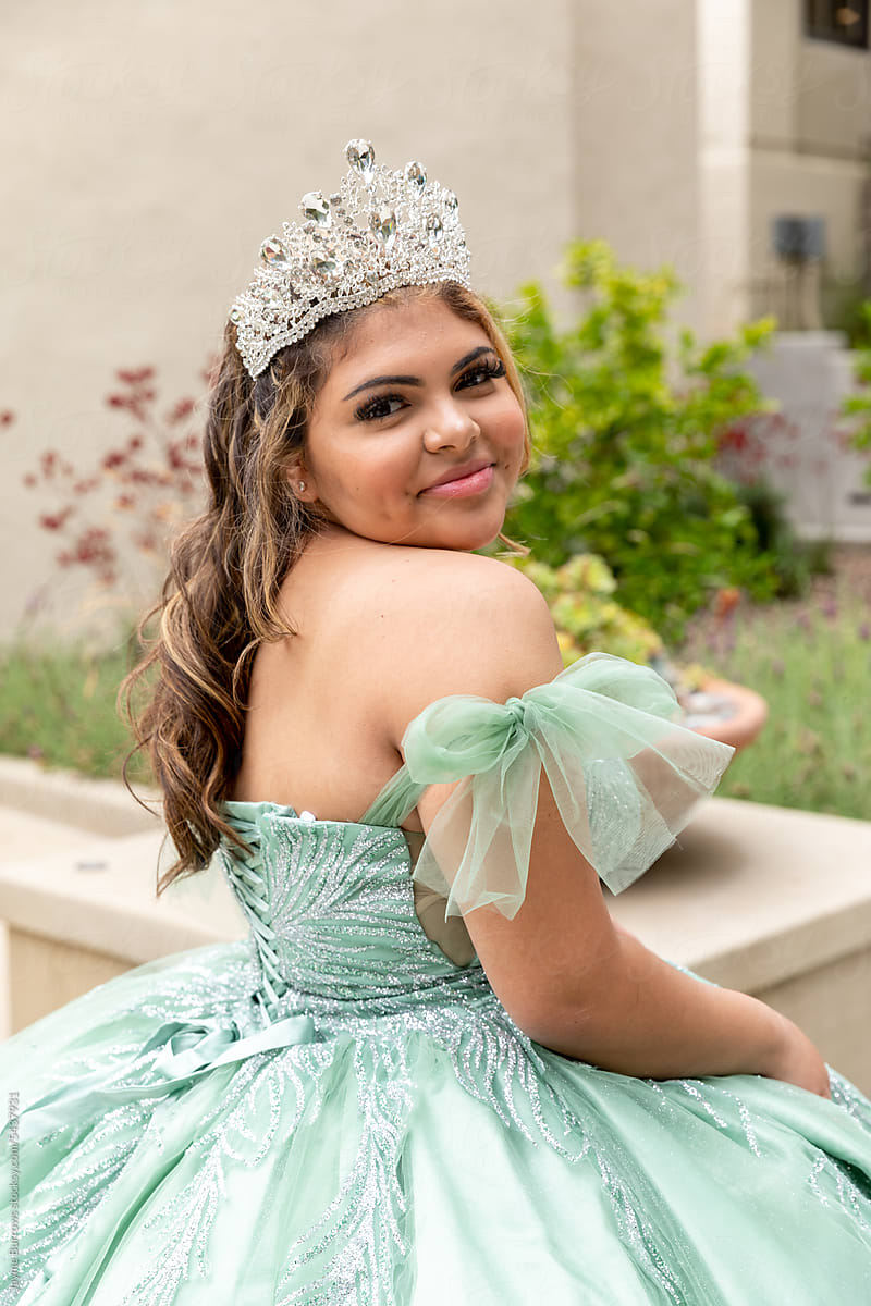 Teenager Dressed in Quinceanera Gown Outdoors
