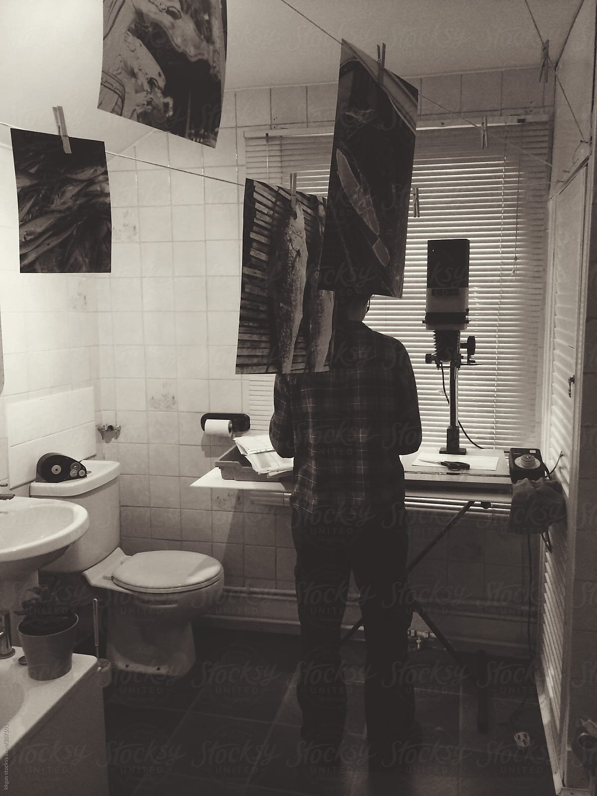 Woman Working At Home In A Darkroom In The Bathroom Del Colaborador De Stocksy Kkgas Stocksy