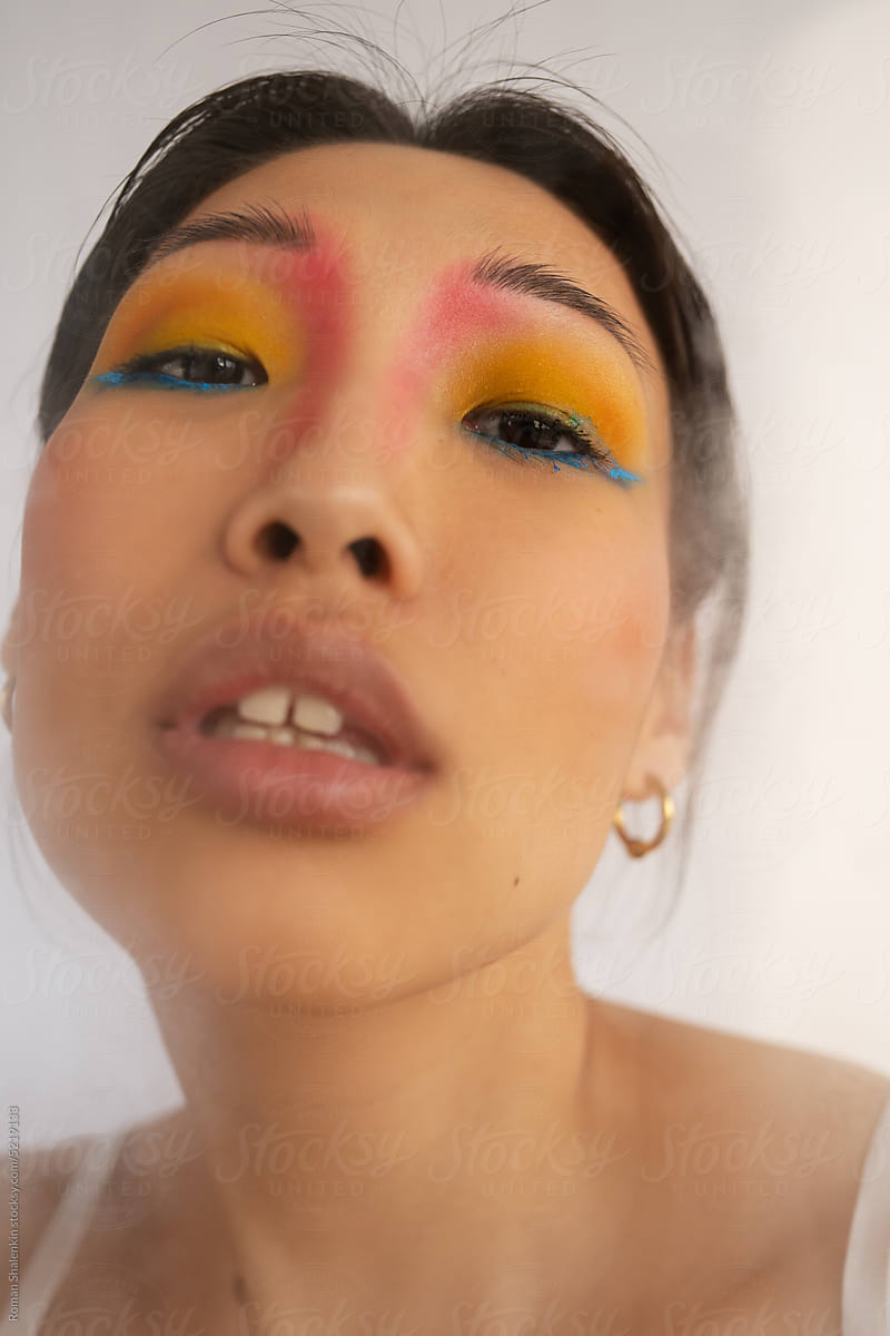 Female Model With Creative Colorful Makeup