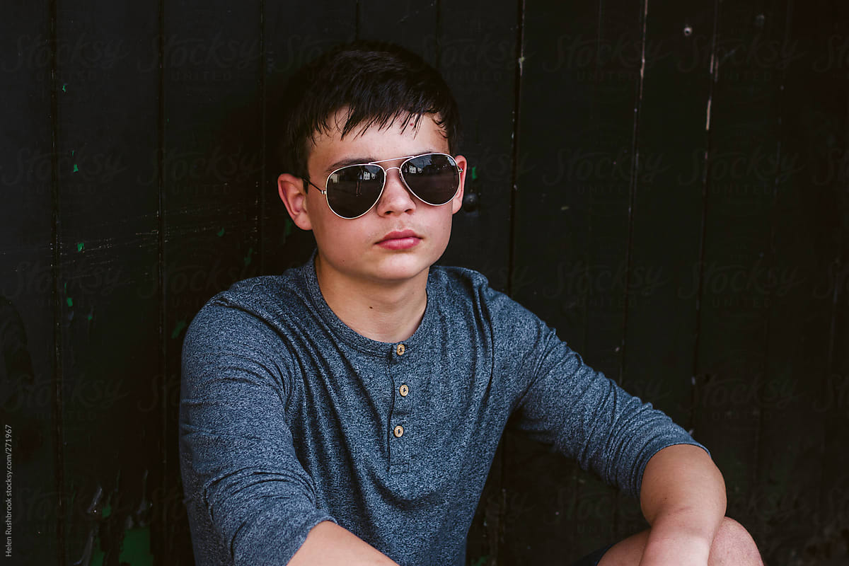 Teenage Boy In Aviator Sunglasses by Stocksy Contributor Helen
