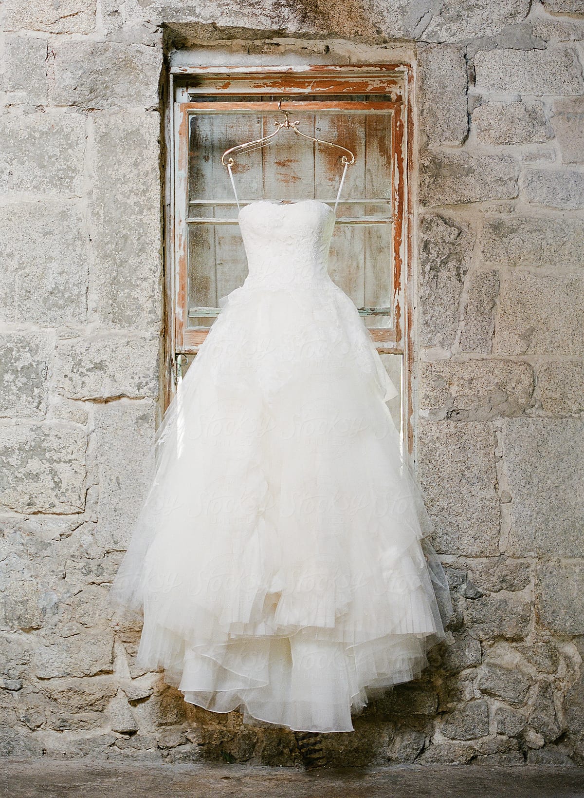 Hanging Wedding Gown by Seth Mourra
