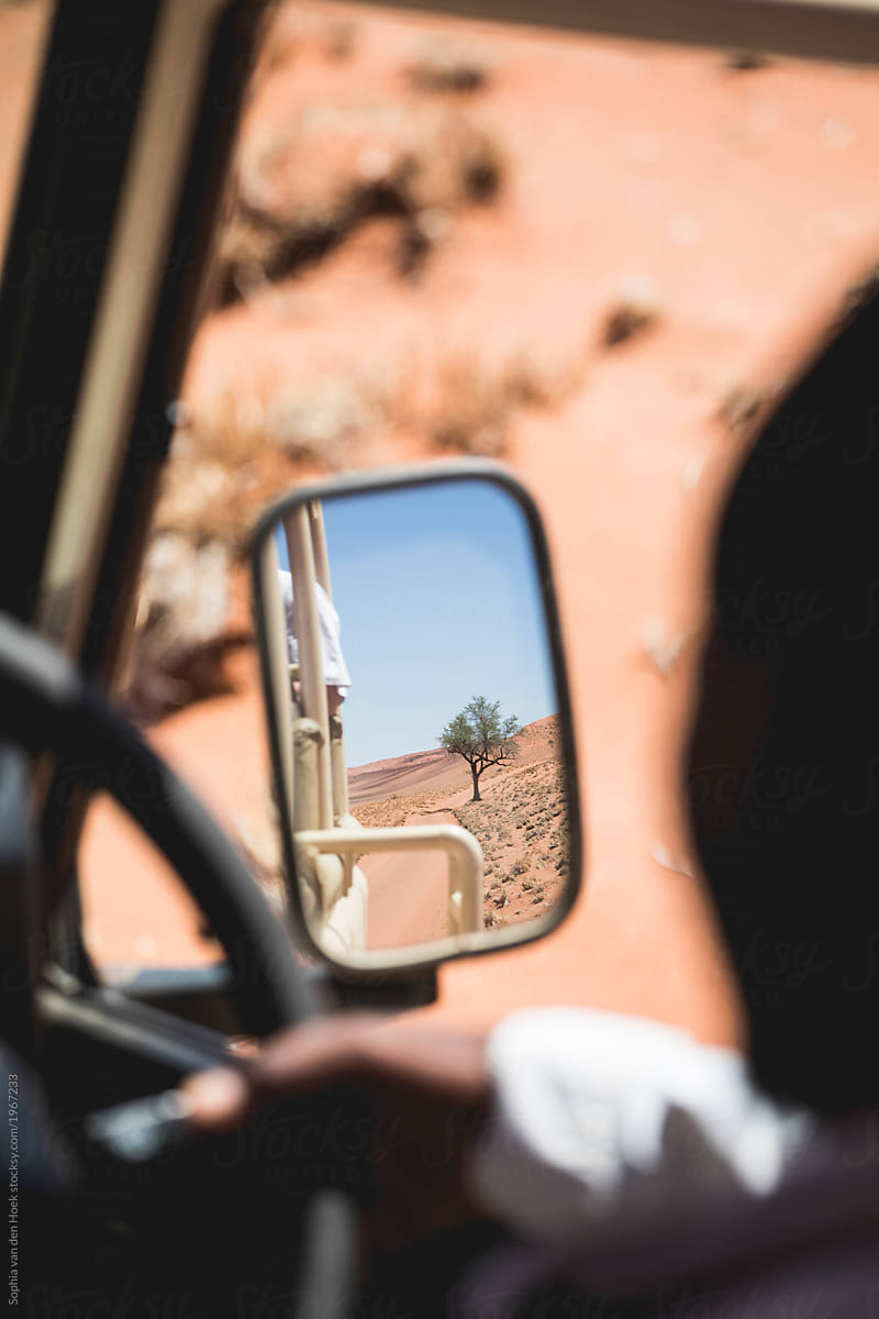 Car mirror view in Namibia