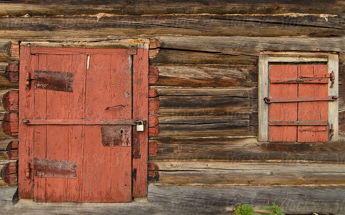 Locked rustic wooden wall, door and window