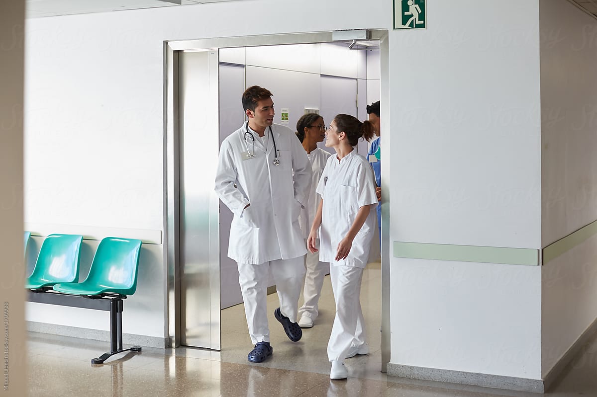 Group of medical staff at work in a hospital corridor