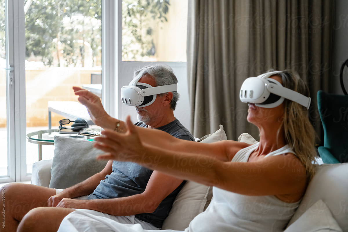 Older couple having fun in VR
