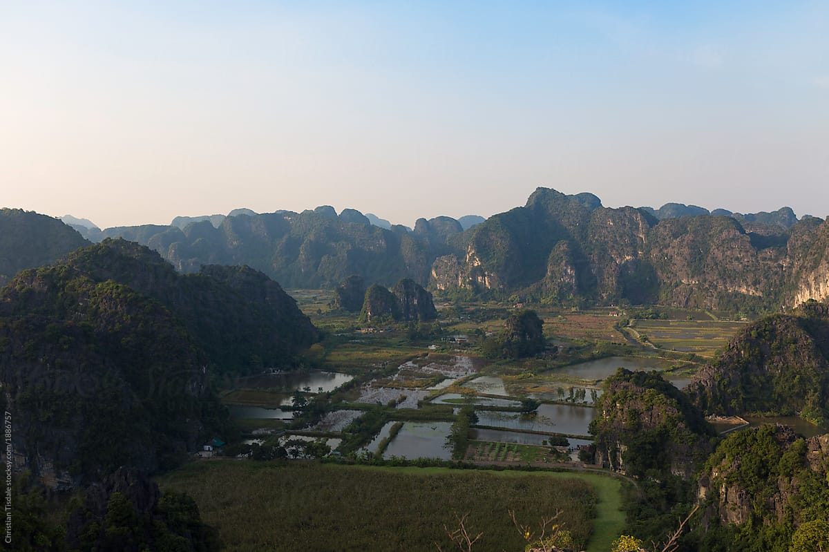 An overhead view of limestone towers in the rice paddies in rural Vietnam