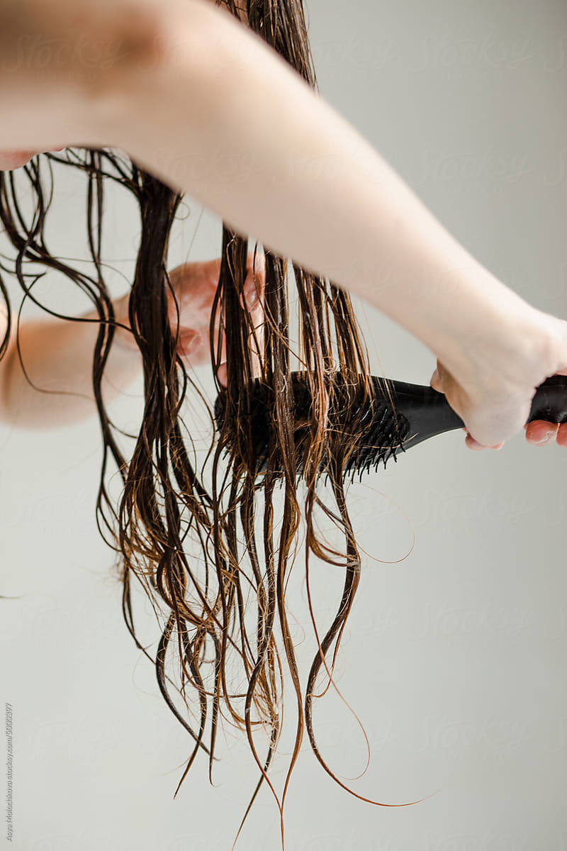 Combing wet and tangled long hair