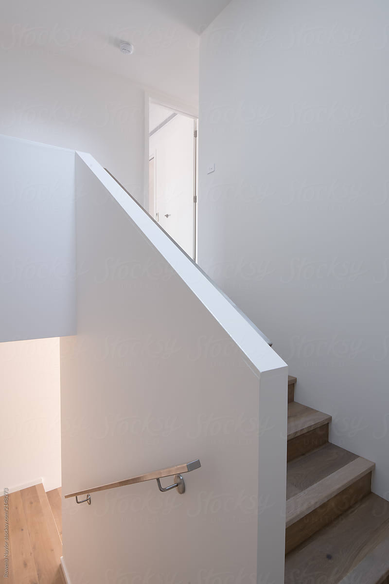 Staircase to upper level in modern townhouse
