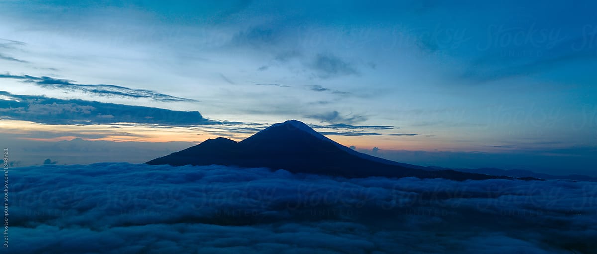 Volcano Batur in sunrise lights
