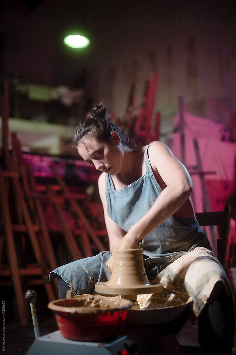 Pottery wheel artisan at her studio