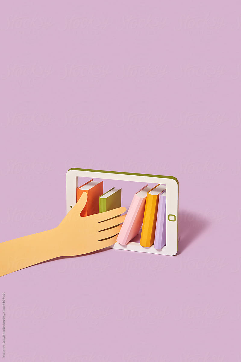 Papercraft hand chooses books in a smartphone.