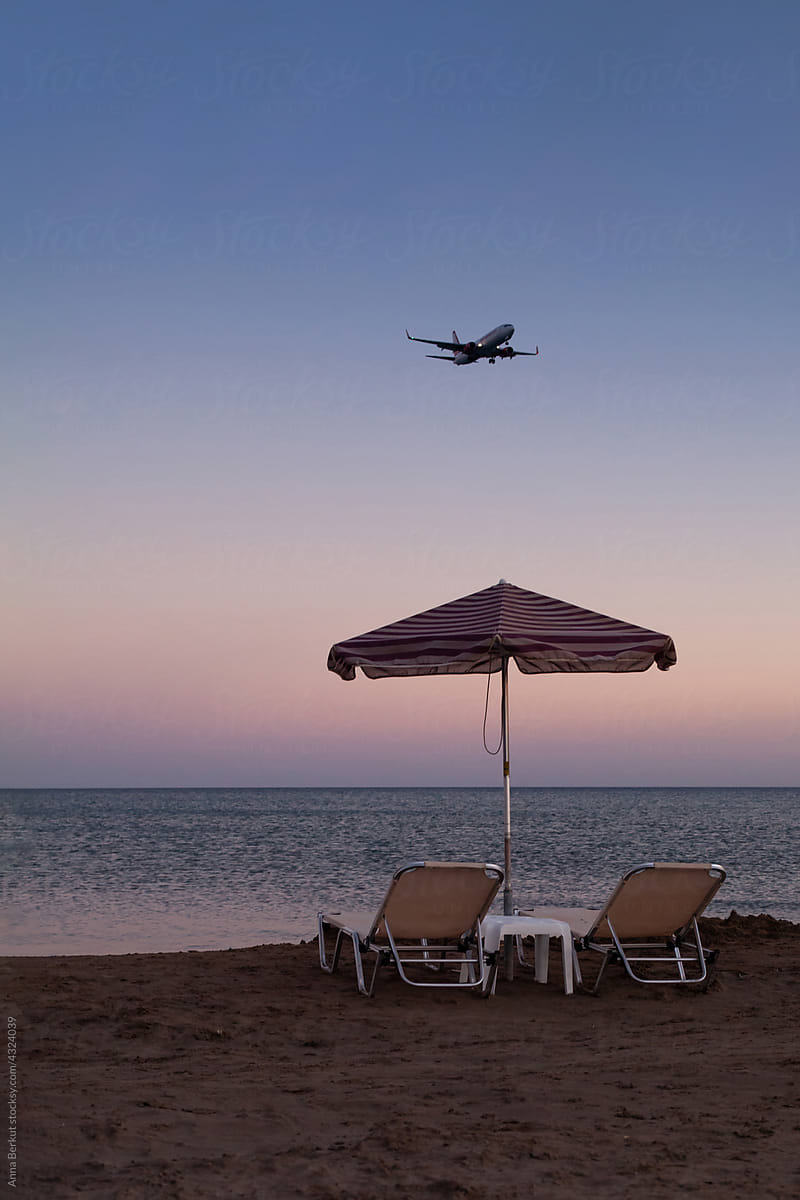 tourism, airplane arriving to beach, summer holidays