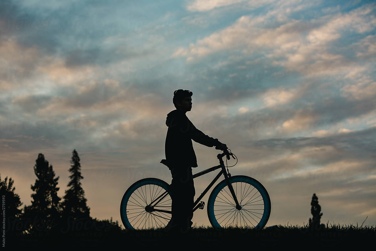 Teenage Boy with Bike Silhouette
