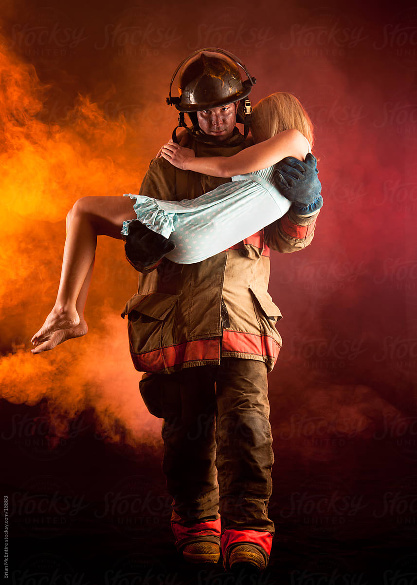 Fireman Carrying Woman From Buring Building