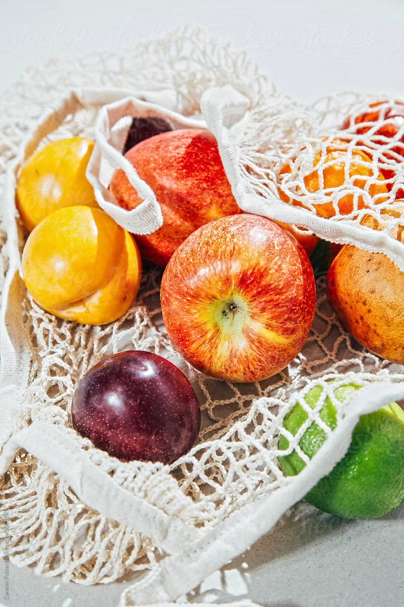 Variety of organic fruits  on a reusable bag