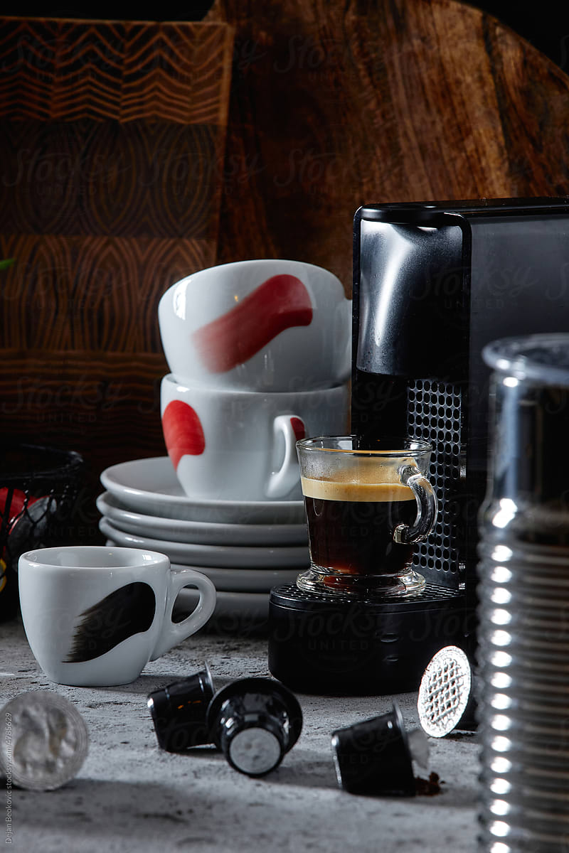 Espresso machine and coffee pods.
