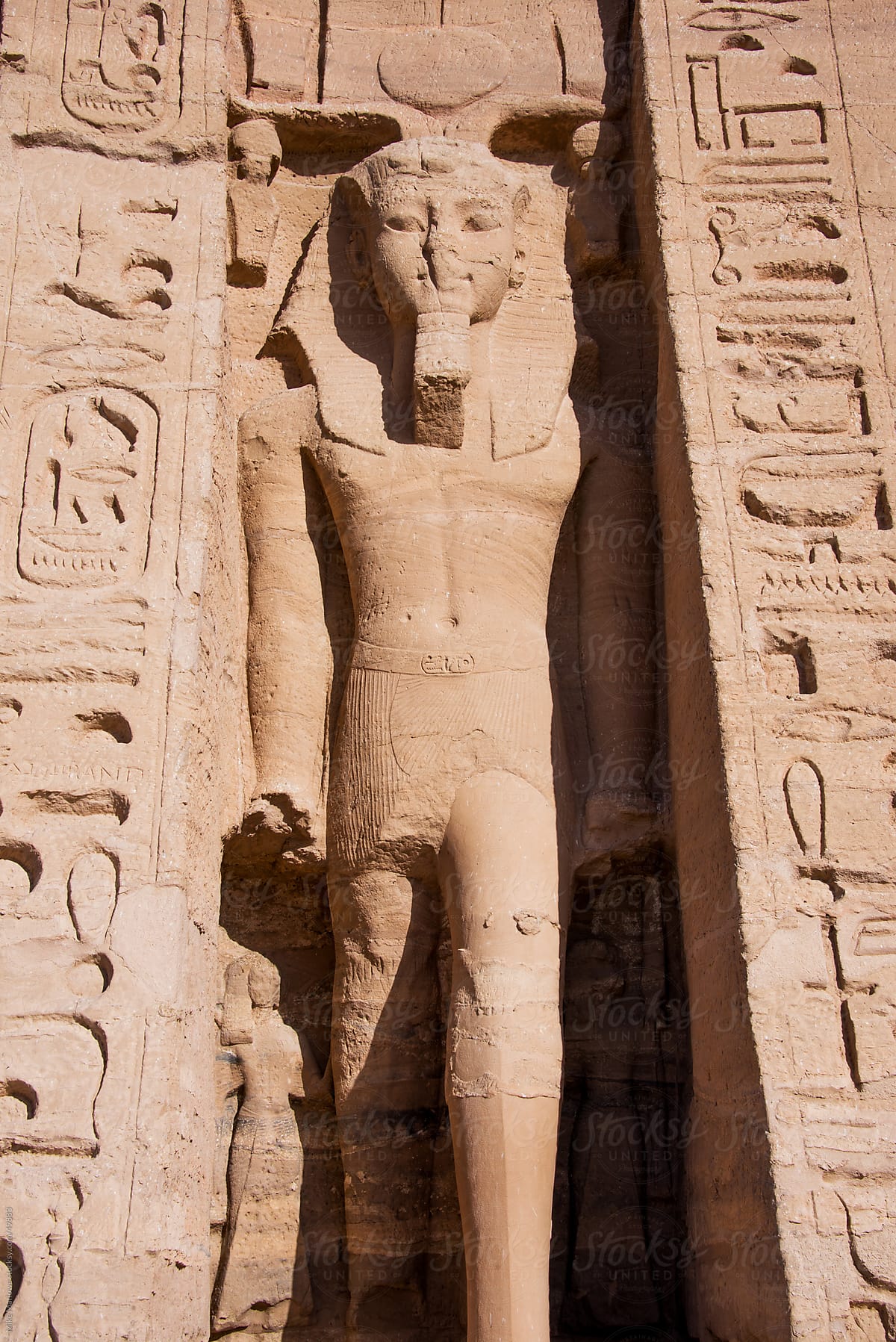 An ancient Egyptian stone carving depicting a human figure.
