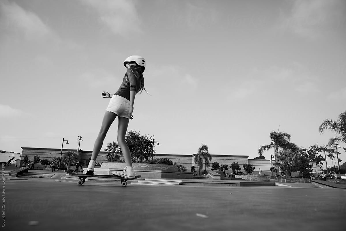 Kids having fun skating at skateboard park in the sunshine