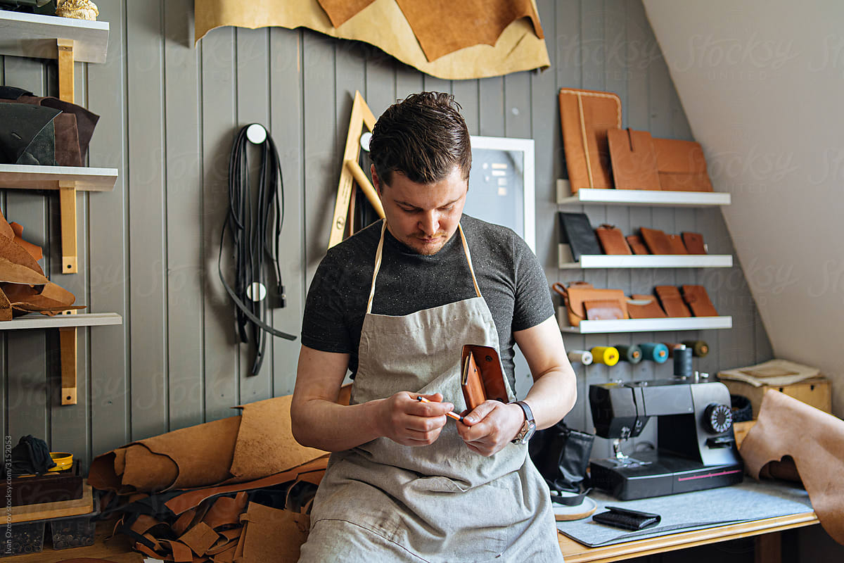 male artisan in his cozy workshop