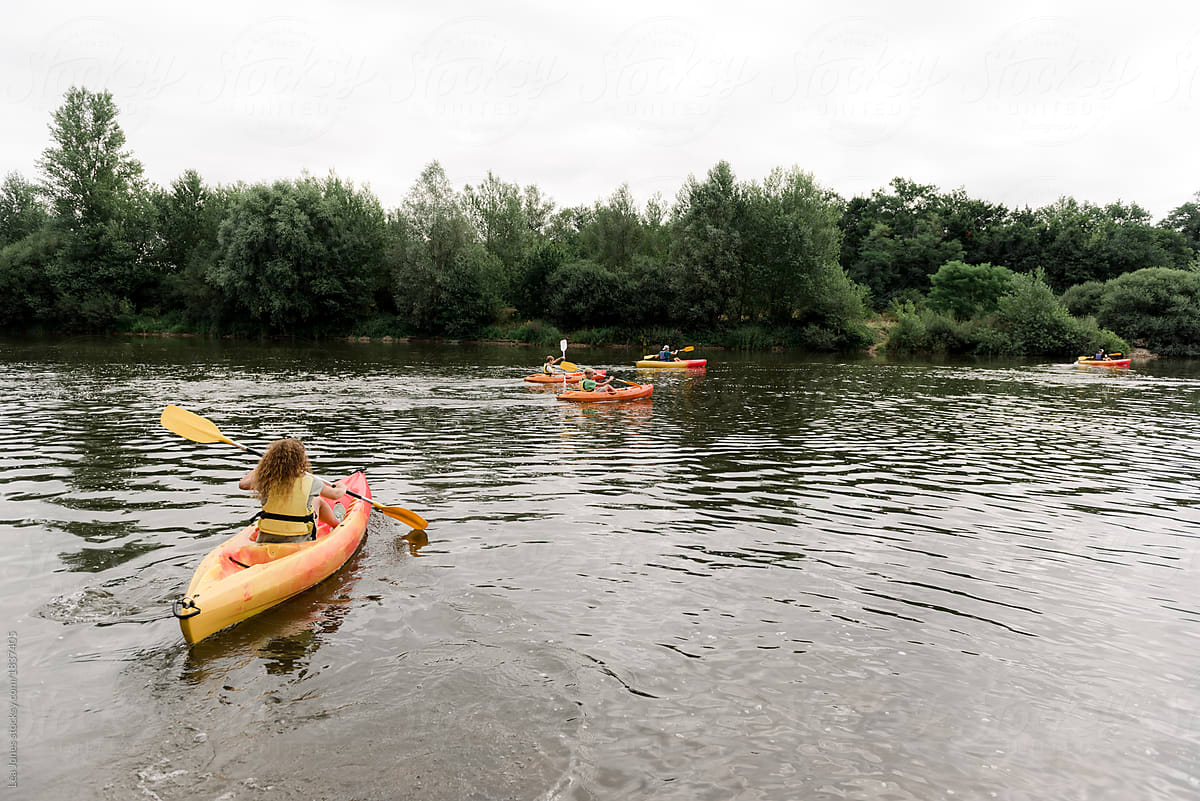 group of young people on kayak outing