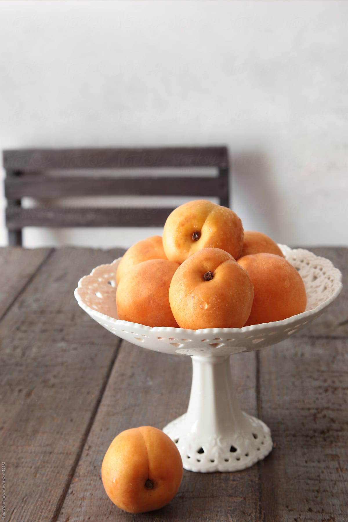 Fresh peaches on old brown table