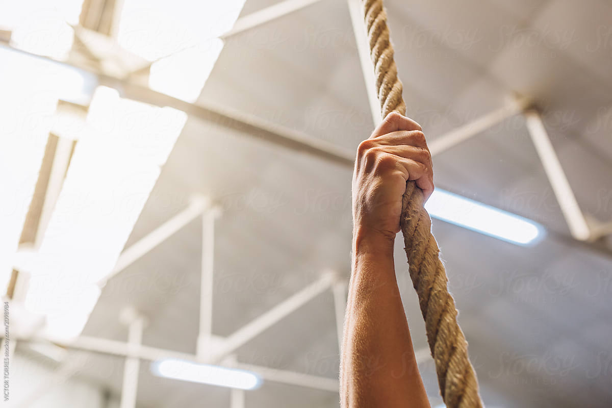 Crop Hand Gripping Rope In Gym By Stocksy Contributor Victor Torres