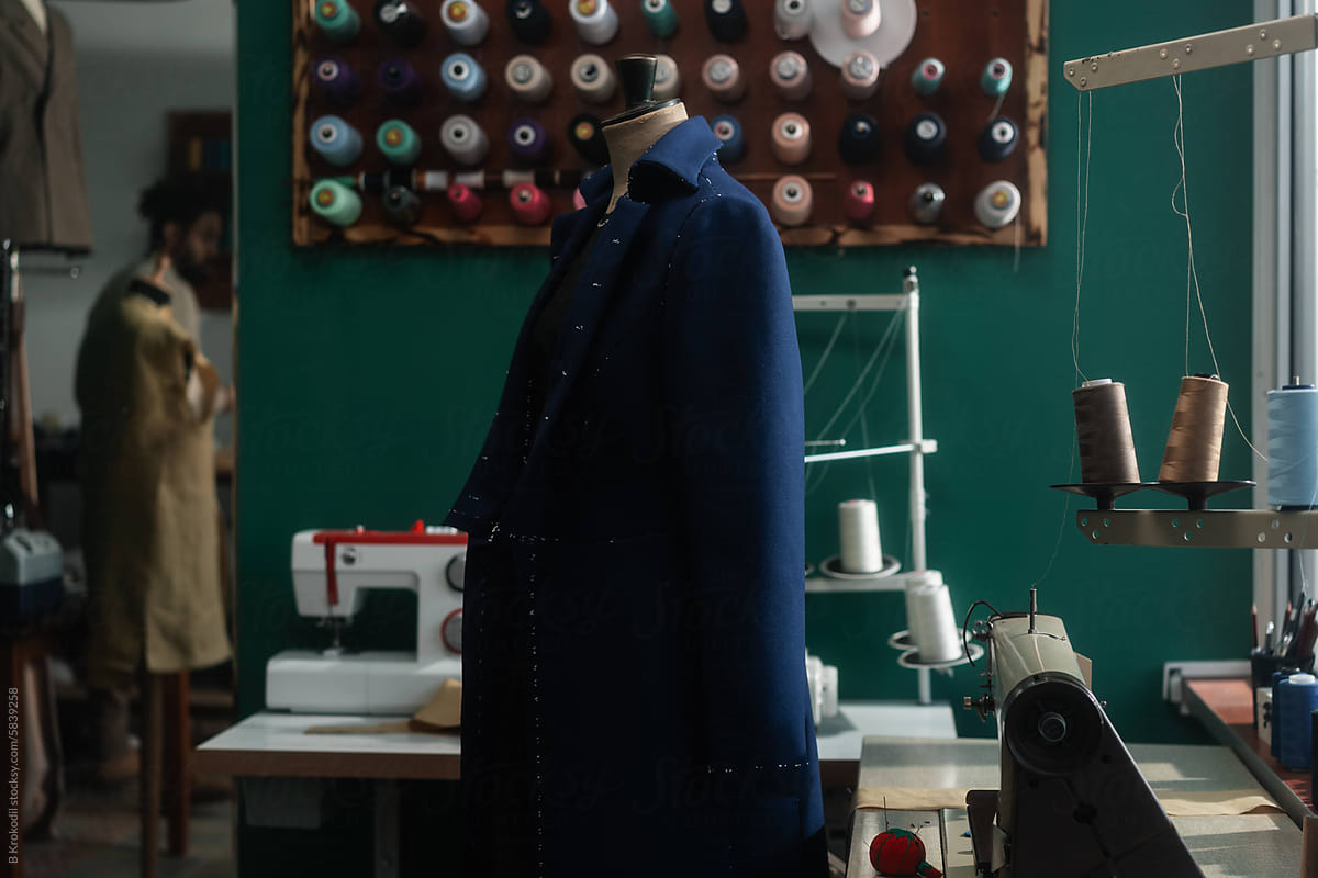 Blue Coat On The Mannequin Doll In The Tailor\'s Workshop