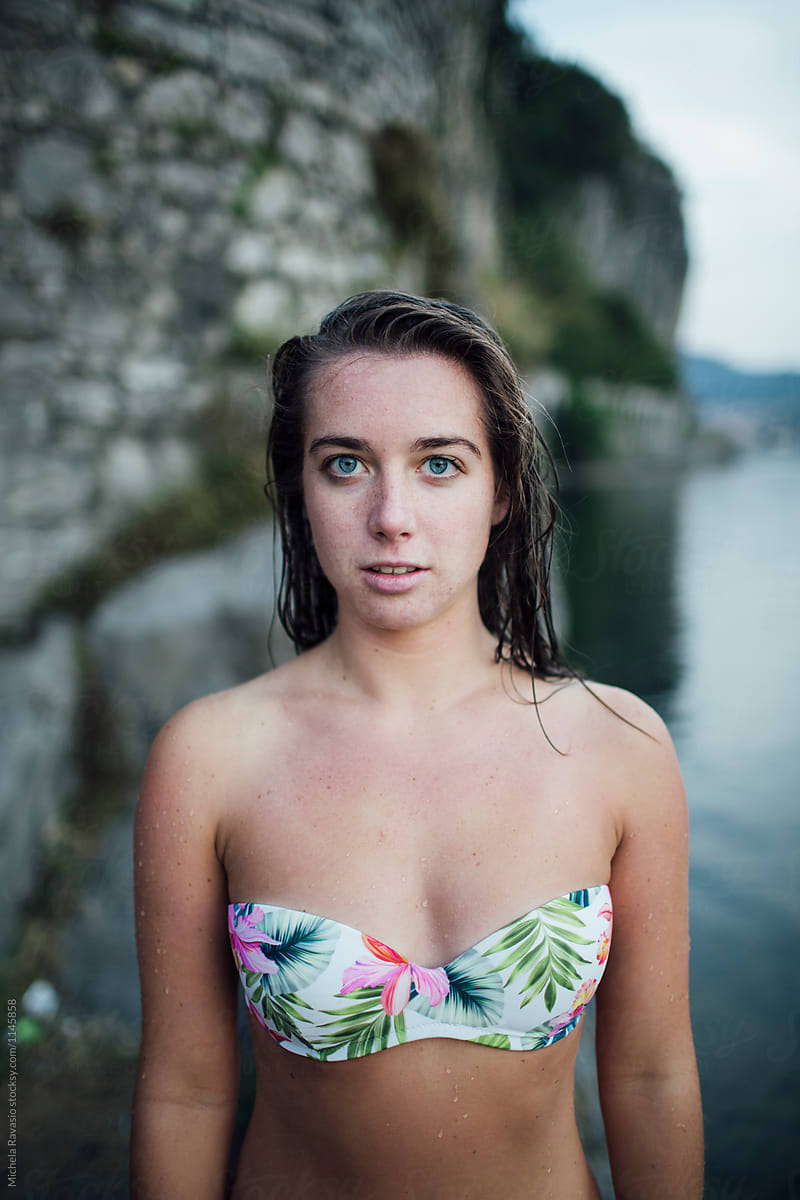 portrait-of-girl-at-lake-by-stocksy-contributor-michela-ravasio