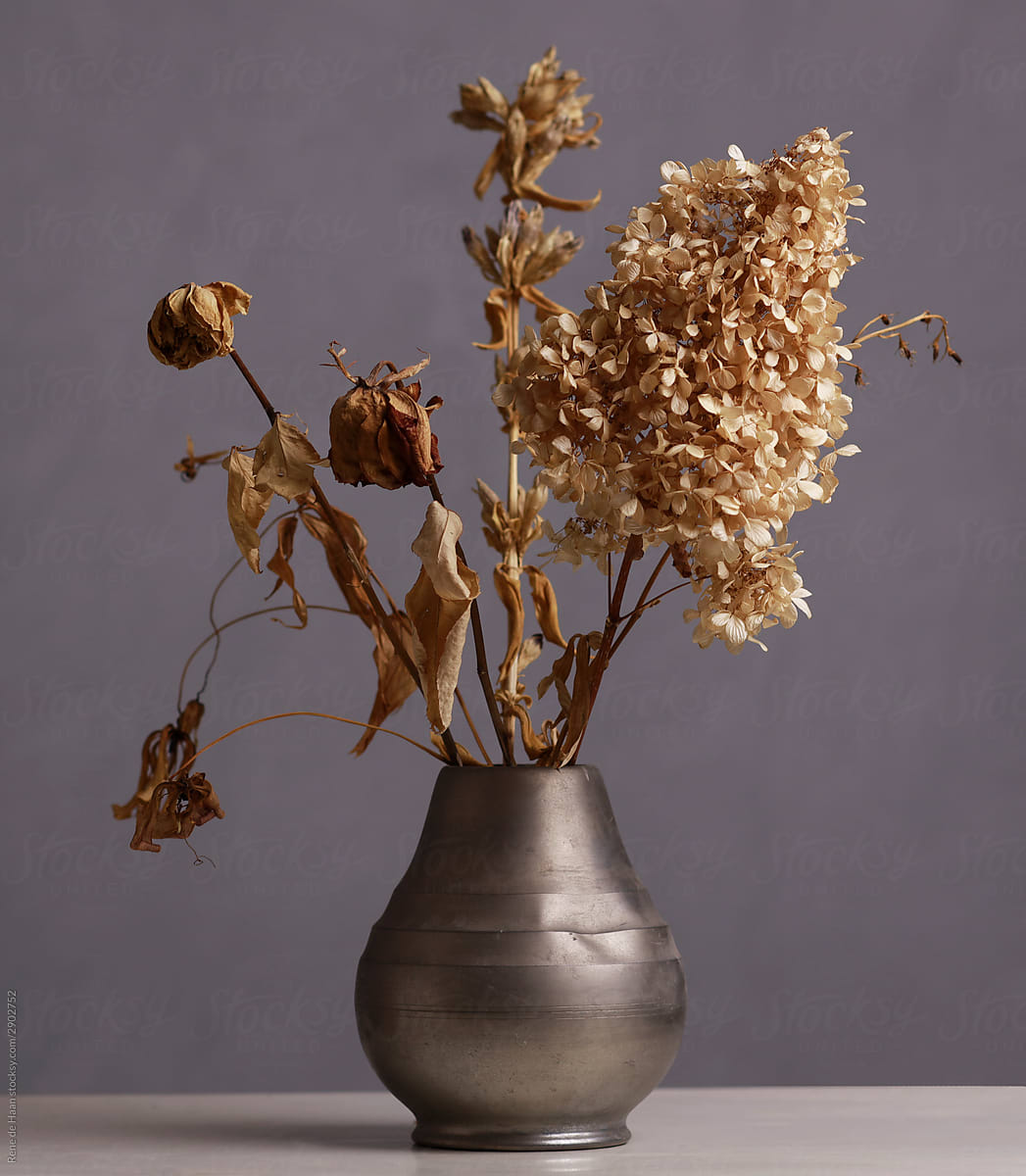 vase with wilted flowers