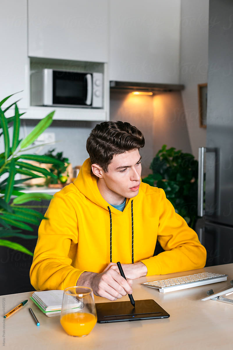 Generation Z man studying at home