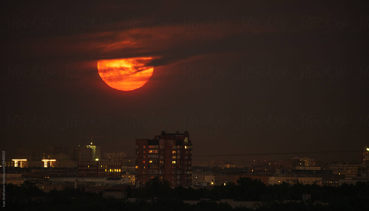 Huge Full Blood Moon Over City Panorama
